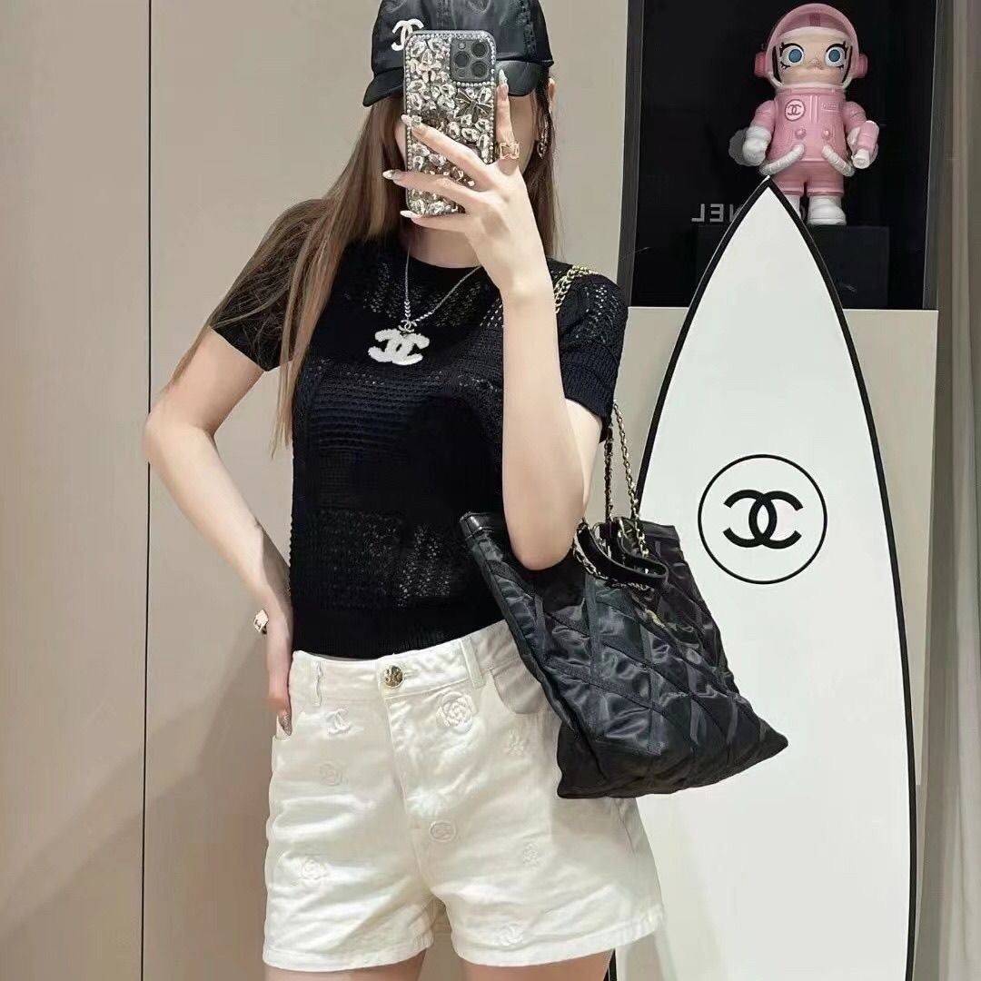 Summer new style hollow round neck knitted top 0724052203