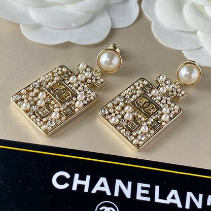 CHA Gold Pear Perfume Bottle Dangle Earrings 1025012222