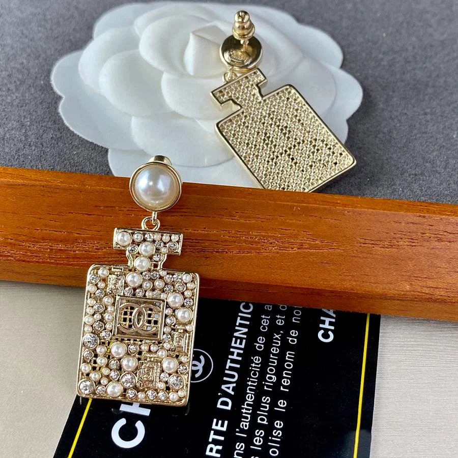 CHA Gold Pear Perfume Bottle Dangle Earrings 1025012222