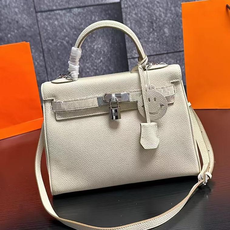 Hms fashionable cowhide handbag 0725091703