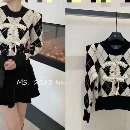 Argyle shoulder padded knitted sweater PD0823112112