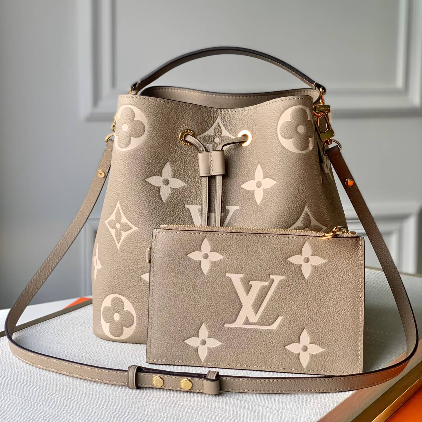 Neonoe MM Dove Cream Bicolor Monogram Empreite Leather Bucket Bag