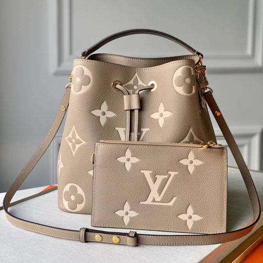 Neonoe MM Dove Cream Bicolor Monogram Empreite Leather Bucket Bag