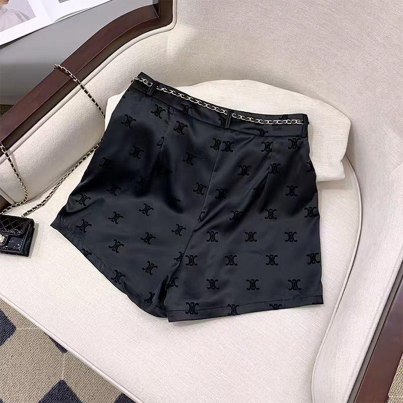 Fashion Joker Flocking Printed Ice Silk Black Shorts 1024042911