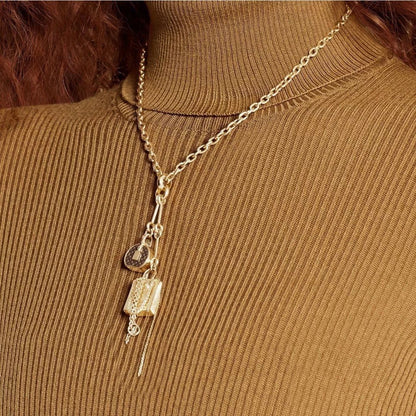 Round cake tassel bag necklace