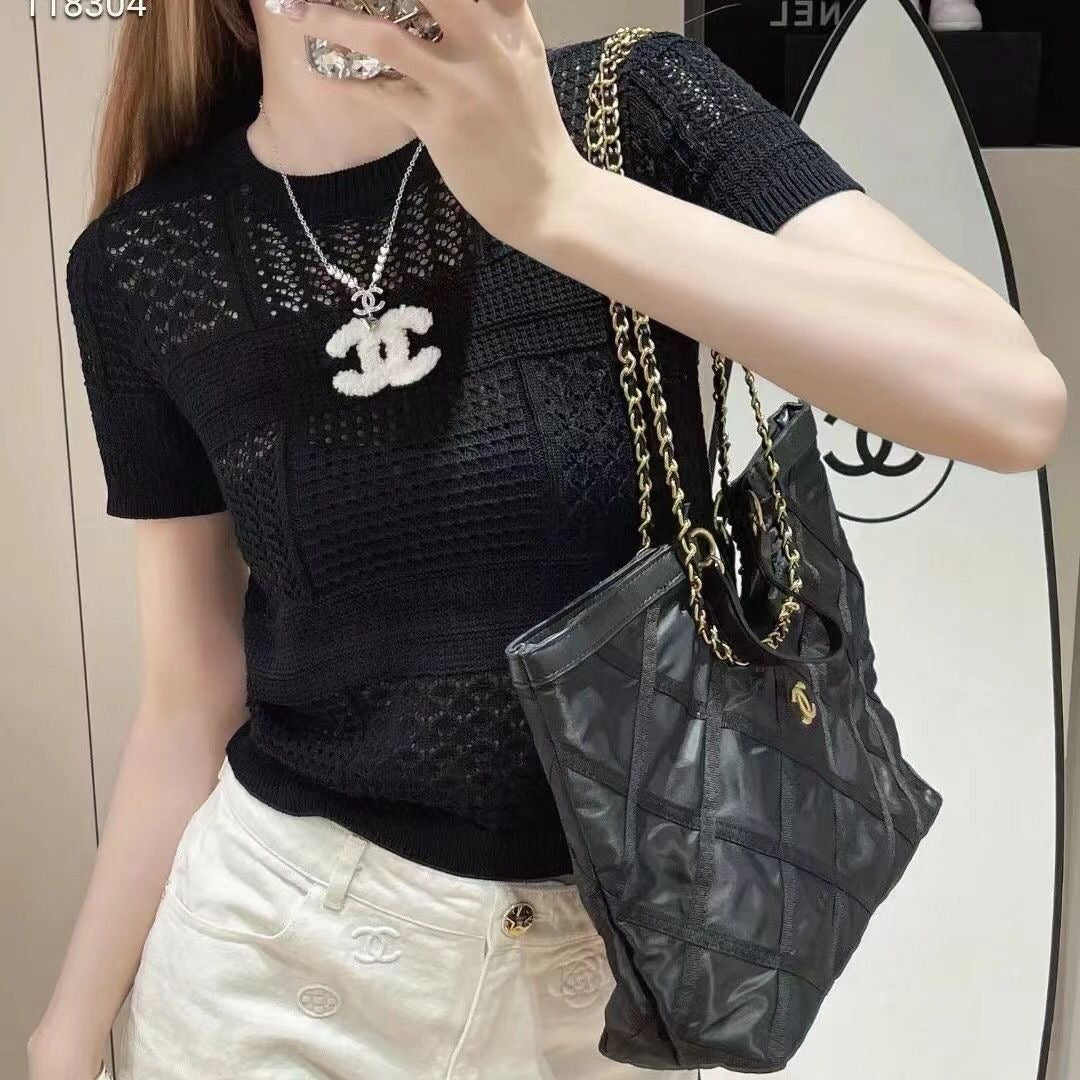 Summer new style hollow round neck knitted top 0724052203
