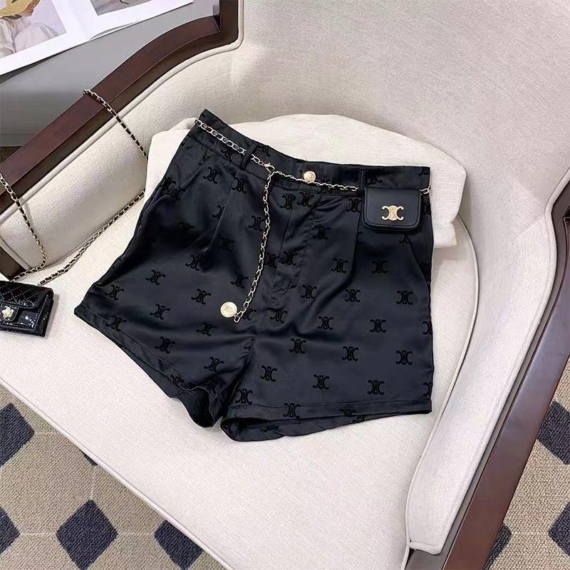 Fashion Joker Flocking Printed Ice Silk Black Shorts 1024042911