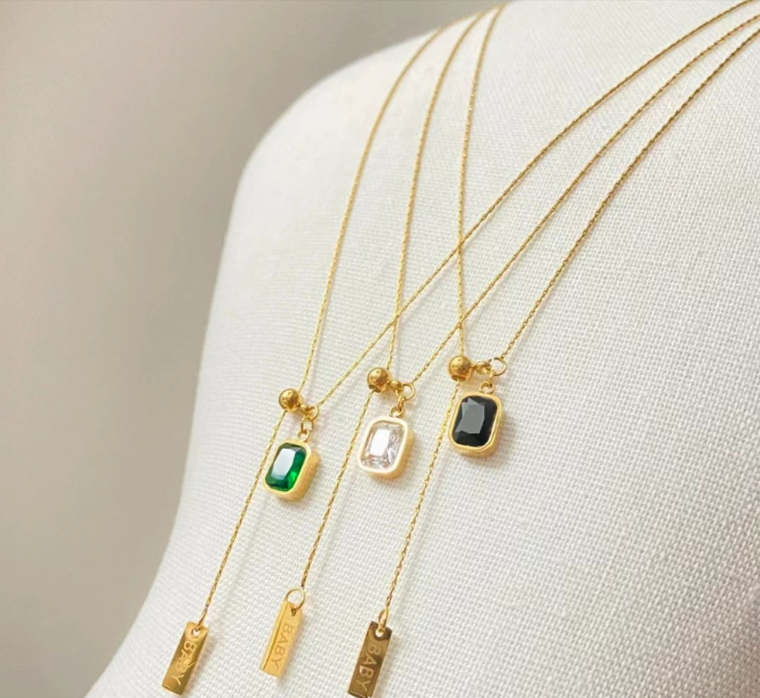 A green necklace with tassels 2025081214