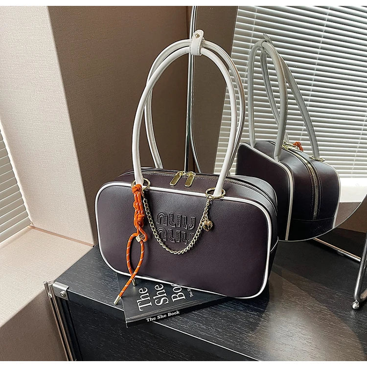 A niche and light luxury single-shoulder Boston bag 2025073003