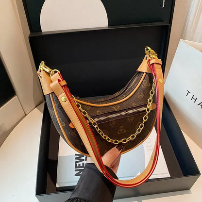 ‌Light luxury crocodile embossed crescent-shaped bag 2025073122